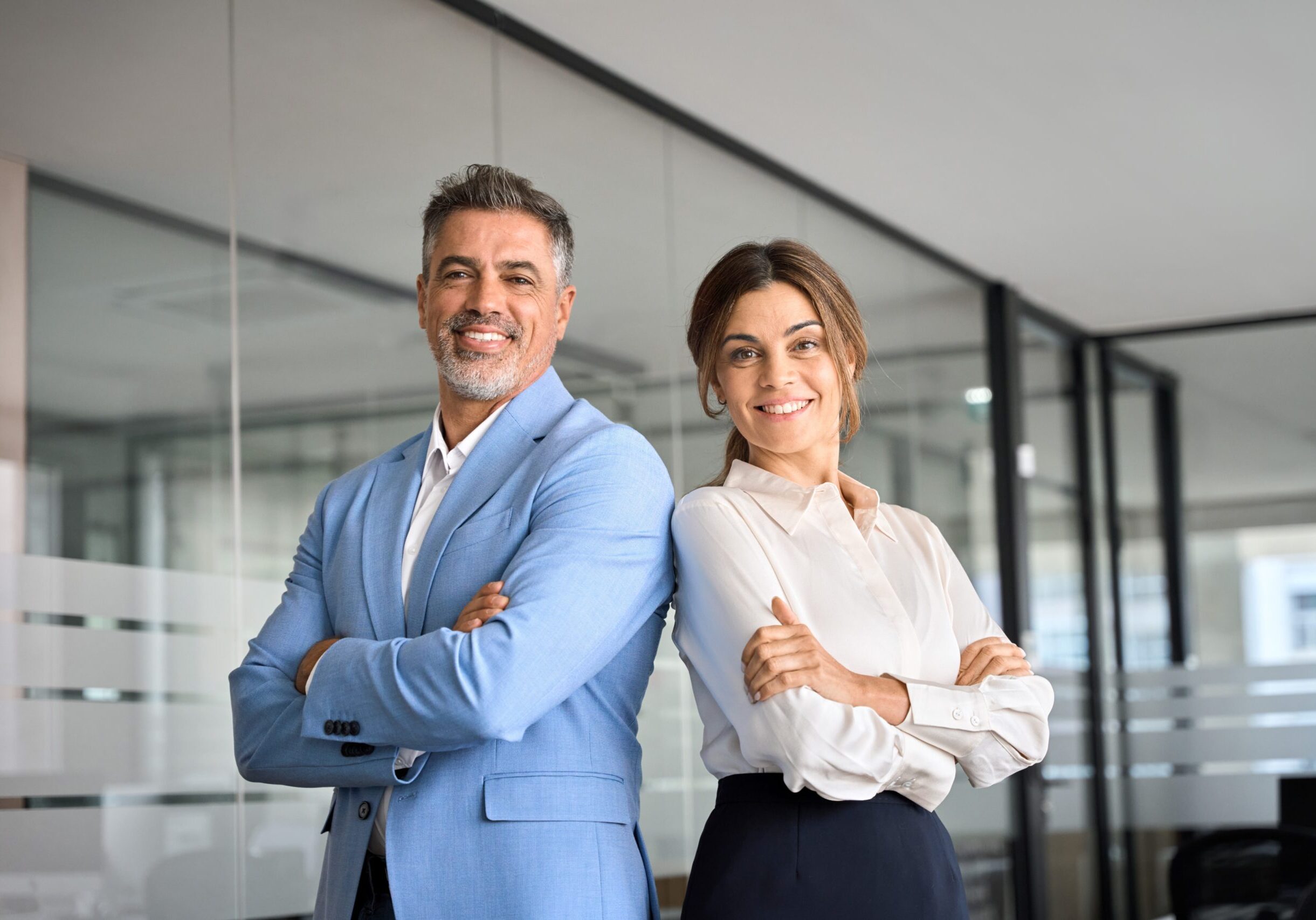 Two,Happy,Executive,Managers,,Mature,Business,Man,And,Woman,Leaders,